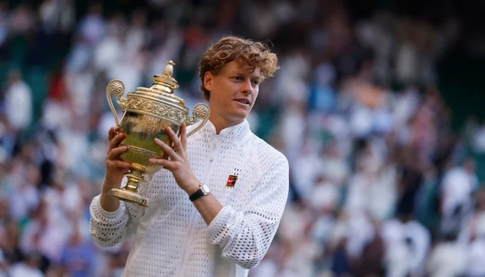 Jannik Sinner celebrates after defeating Alexander Zverev to win the Wimbledon men's singles title.