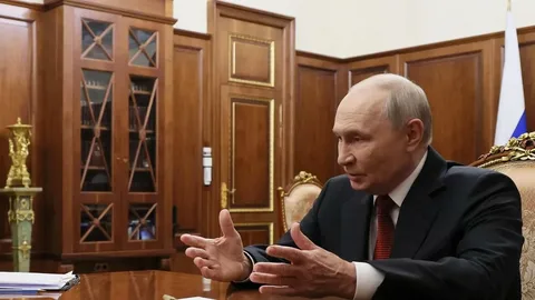Vladimir Putin speaking on Russian state television about Ukraine strikes
