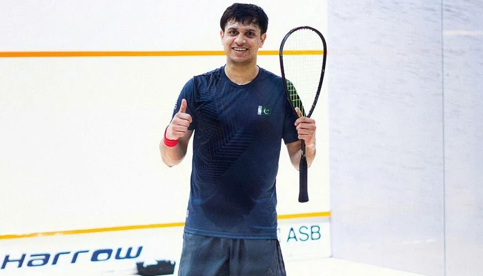 Pakistani squash player Asim Khan in action during an Asian Games match