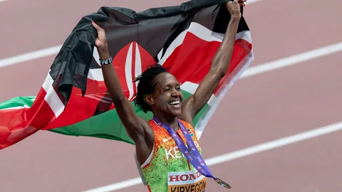 Kenyan athletes celebrating on a running track ahead of the 2029 World Athletics Championships in Nairobi