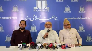 Jamaat-e-Islami Pakistan Ameer Hafiz Naeem ur Rehman addressing supporters at a rally
