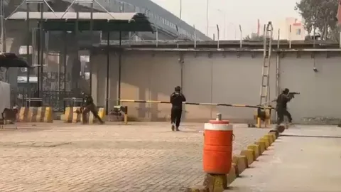 Police check post in Peshawar fitted with anti-drone protective netting